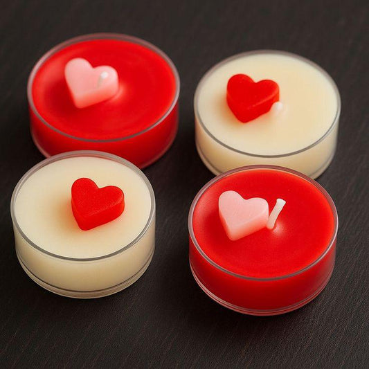 Heart-shaped soy wax floral candles by Fiorance Luxe on a dark surface, ideal for gifting.