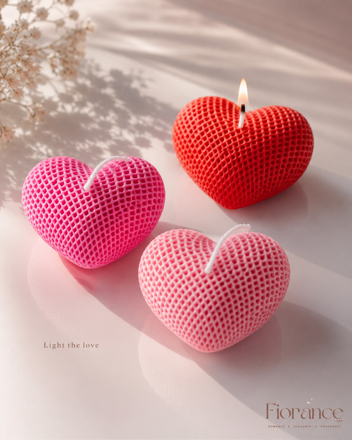 Heart-shaped candles in red and pink on a light background with 'Fiorance' branding.