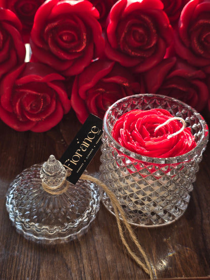Fiorance Luxe floral soy wax rose candle in crystal jar with red roses background, luxury décor