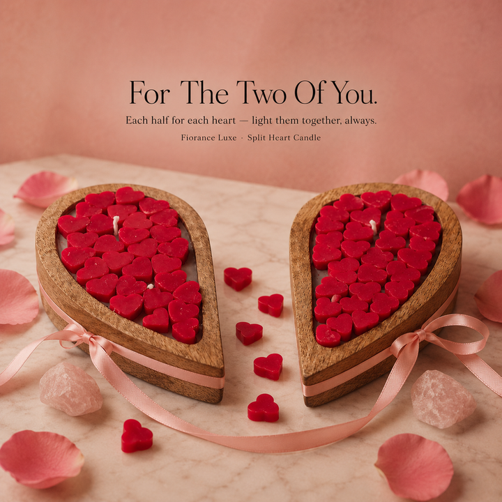 Heart-shaped candles with red wax pieces and pink ribbons on a soft pink background.