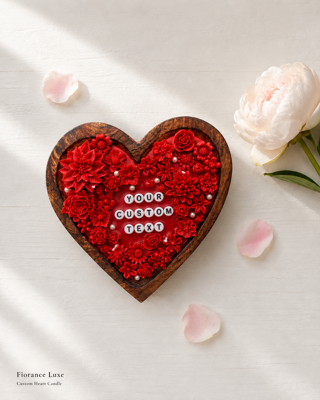 Heart-shaped wooden candle with red floral design and 'Your Custom Text' on a light background with flowers.