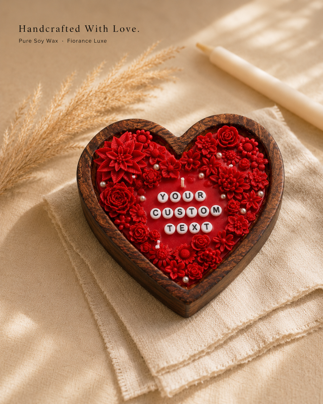 Heart-shaped wooden box with red floral design and customizable text on a beige surface.